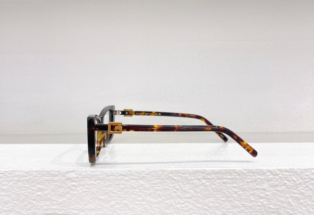 Lunettes de soleil Gucci Oversize Motif Signature
