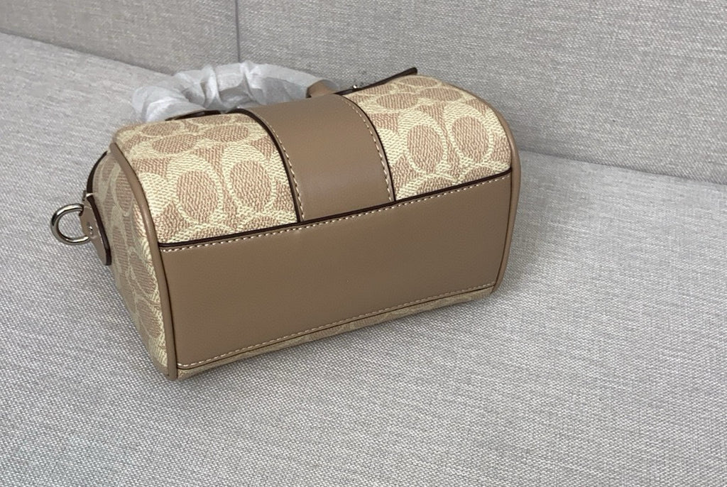 Le sac seau Boston Rowan de Coach