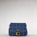 Le sac Coach CA105 Pillow Madison, en toile de coton tigré,