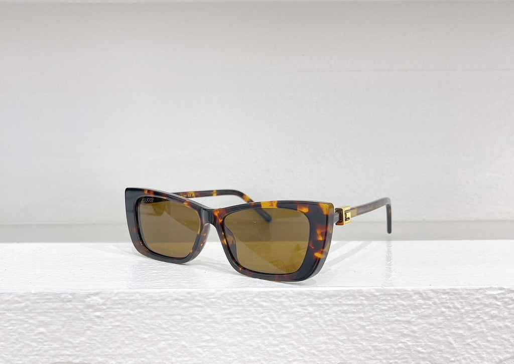Lunettes de soleil Gucci Oversize Motif Signature