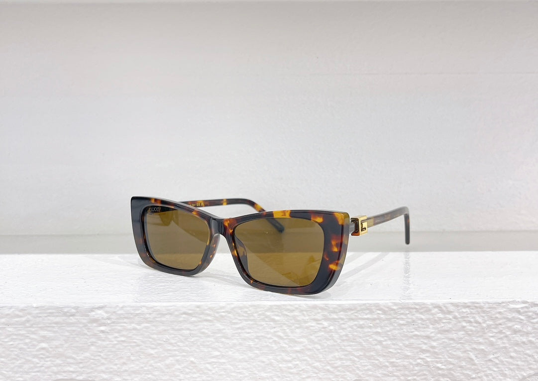 Lunettes de soleil Gucci Oversize Motif Signature