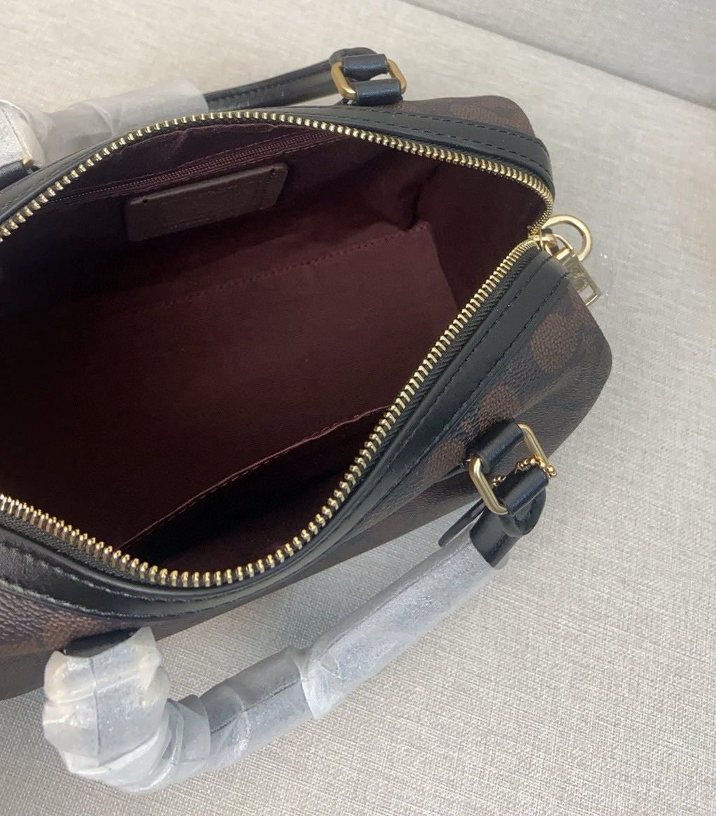 le sac seau Boston Rowan de Coach,
