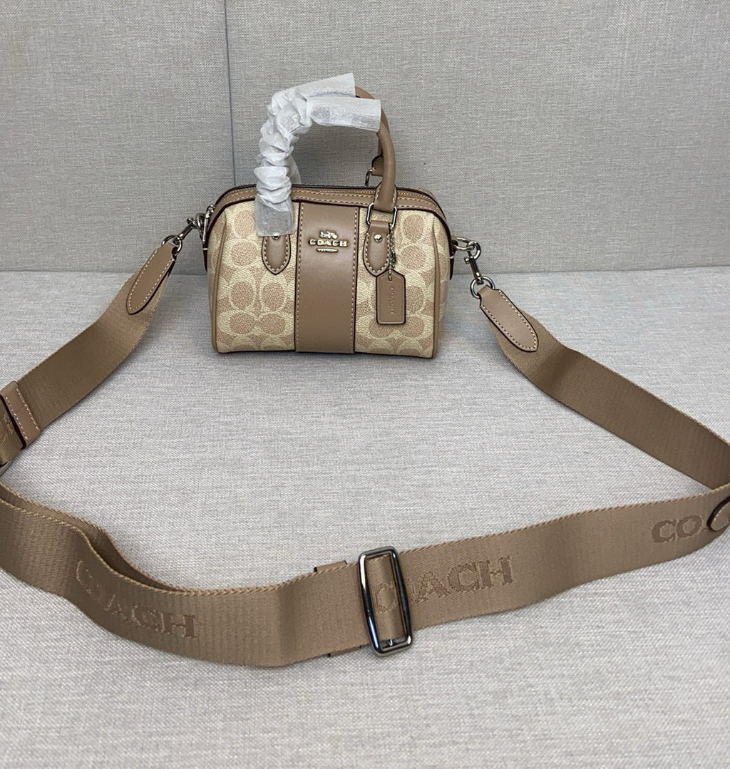 Le sac seau Boston Rowan de Coach
