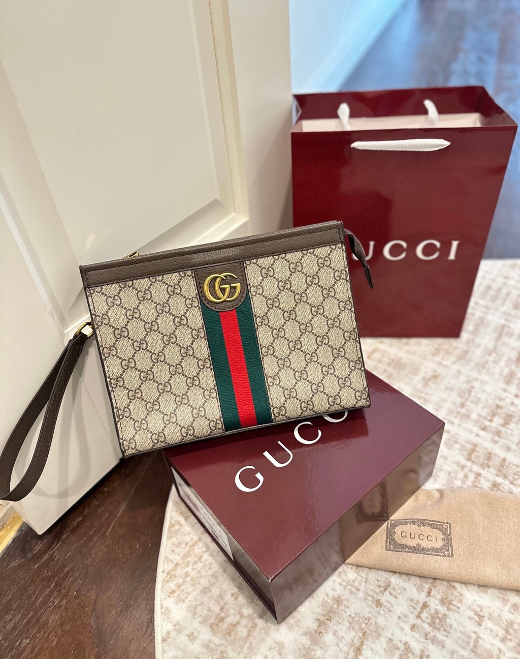 Pochette Ophidia en toile monogramme avec bande Web