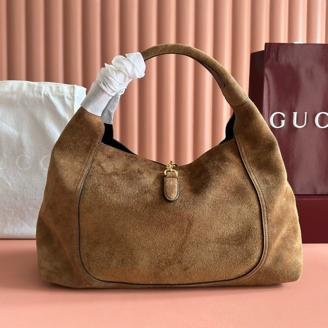 Sac Stirrup Hobo en daim avec fermoir étrier