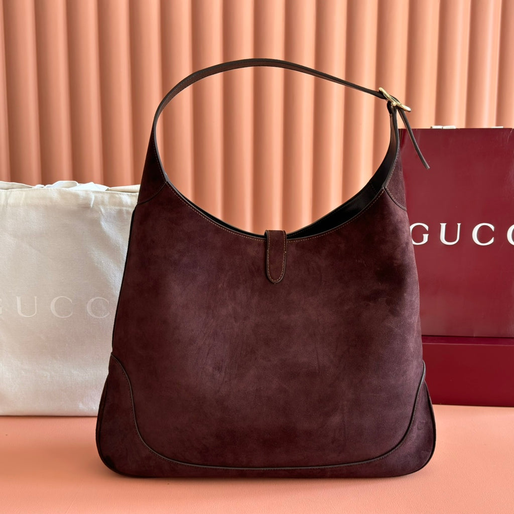 Sac Jackie 1961 en daim avec fermoir piston