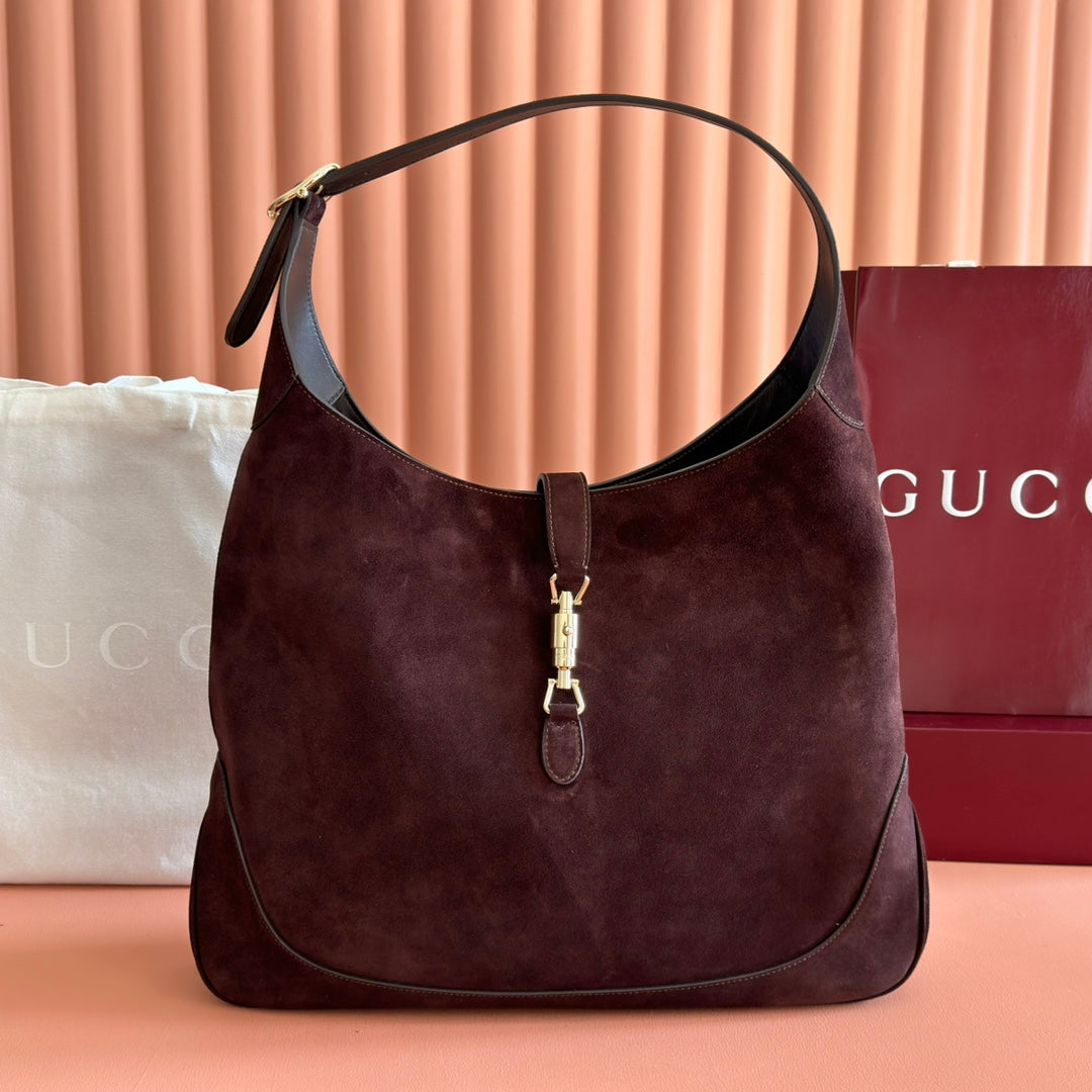 Sac Jackie 1961 en daim avec fermoir piston