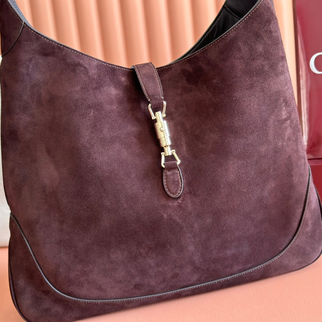 Sac Jackie 1961 en daim avec fermoir piston