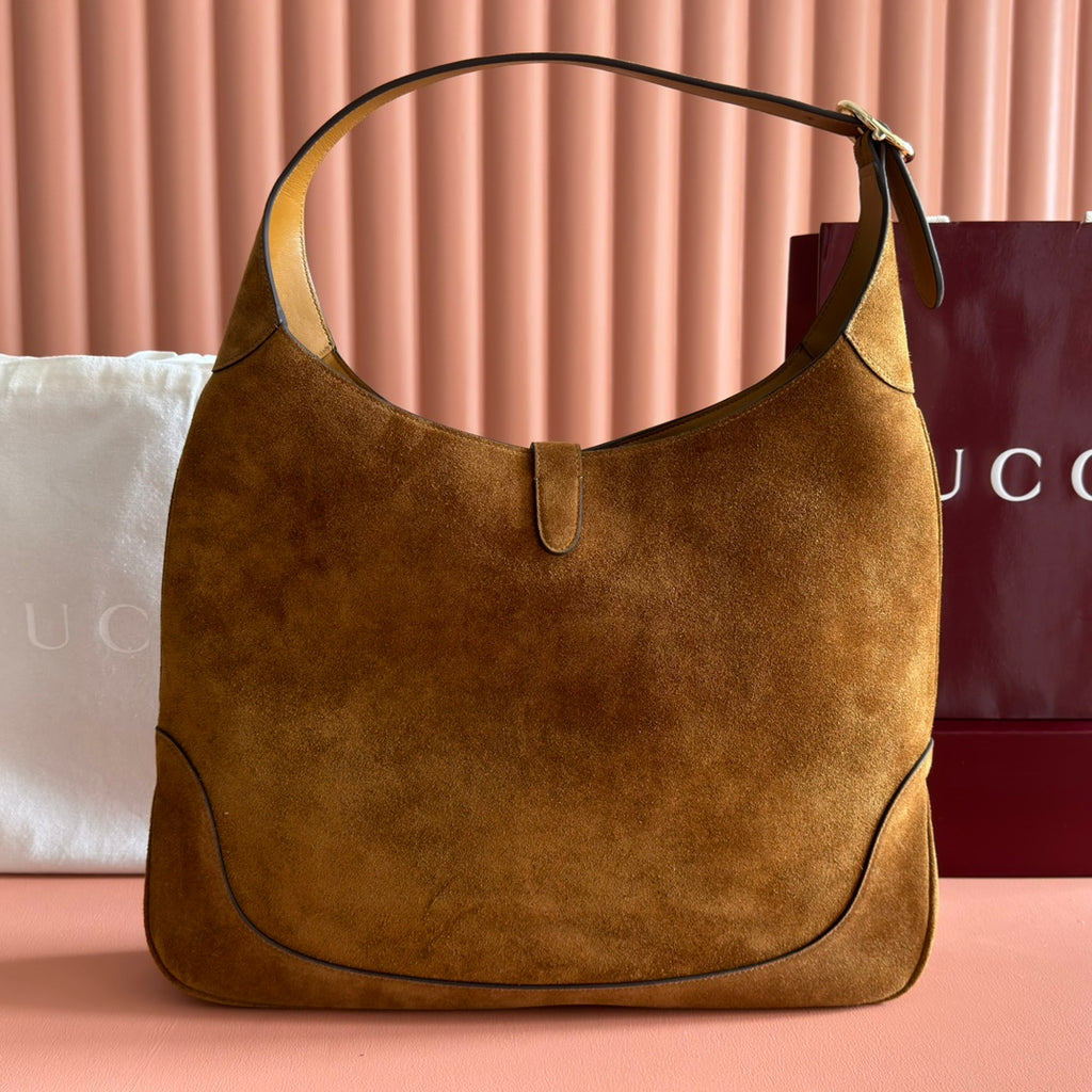 Sac Jackie 1961 en daim avec fermoir piston