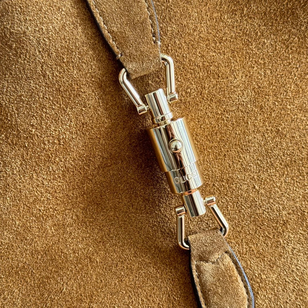 Sac Jackie 1961 en daim avec fermoir piston