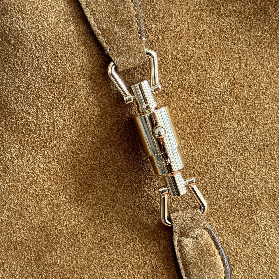 Sac Jackie 1961 en daim avec fermoir piston